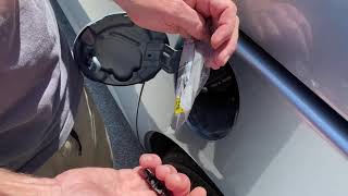 How to install a new filler cap clip on a Honda.