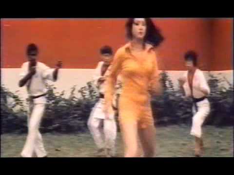 Cleopatra Wong (Marrie Lee) fights against a bunch of angry  judokas