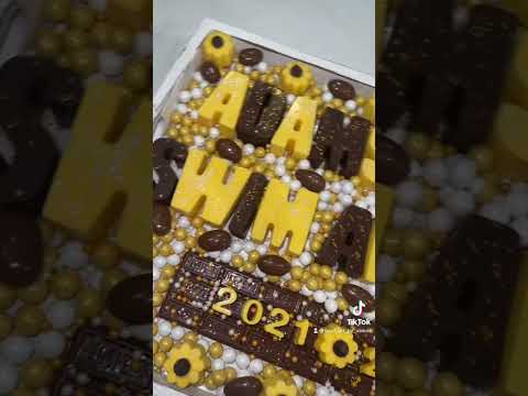 Personalized colored white chocolate letters, Hershey bar and candy pearls for a swim team!