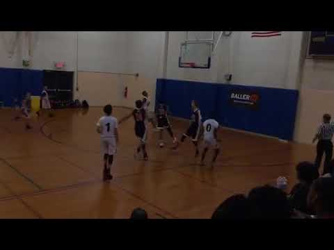 Lansing Spartans with a win over CIA Bounce West, 55-52 - Boys Spartan Classic