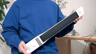 is my favourite just because he has it propped up on his shoulder like a violin just because he's on the sting setting despite having no reason to do that, violin gang aproves（00:00:56 - 00:01:40） - How Can I Play This Digital Guitar???