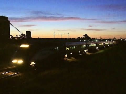 Passenger trains at twilight - Melbourne Trains & Public Transport in Australia - PoathTV