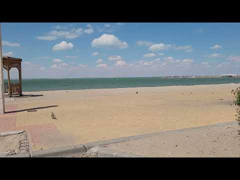 Hyperlapse of moving clouds in kuwait shuwaikh beach