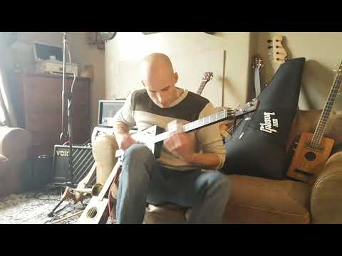 Jamming the blues on my cigar box guitar with my Celestial slide.