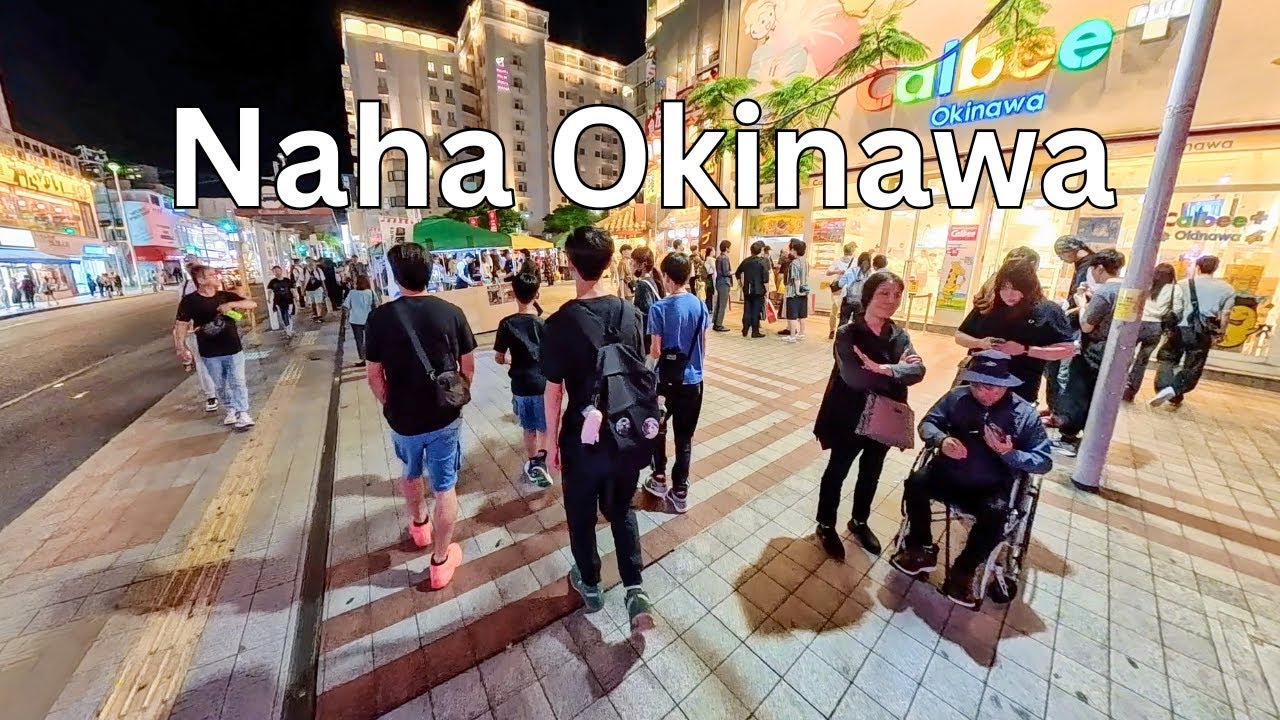 Immersive street-level walking tour through Naha Kokusai Street, Japan, showcasing authentic urban landscapes, local architecture, and the vibrant atmosphere of the city's neighborhoods
