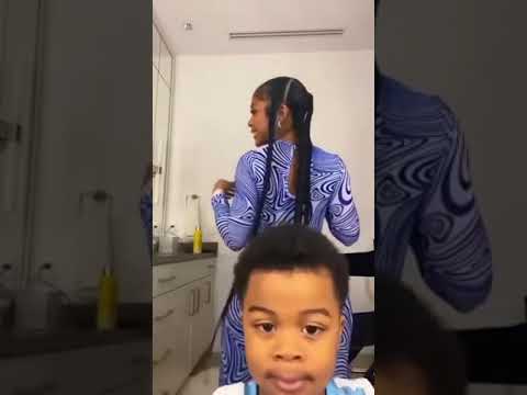 Lil baby's son stopping his mum from shaking her booty to the world.
