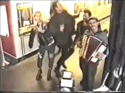 The Casualties and friends dance to street performer in Spain