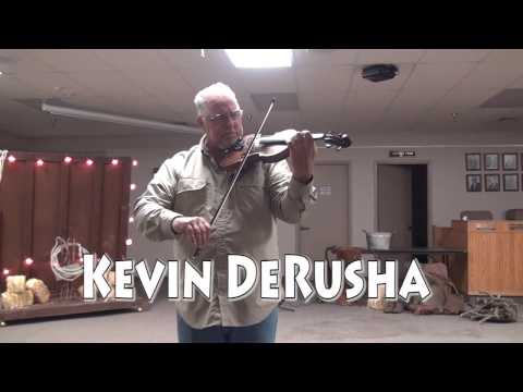 Kevin DeRusha playing fiddle