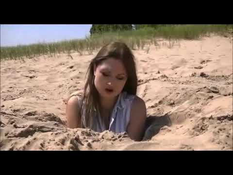 Girl sinking in quicksand 