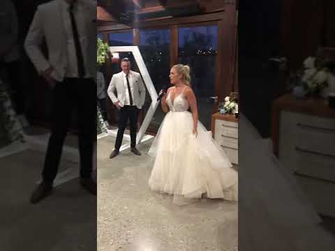 Bride sings her own version of Taylor Swift’s “Love Story” to her Groom at their wedding