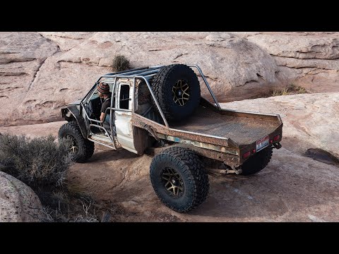 Roll Cage + 37'S on the Totaled Tacoma