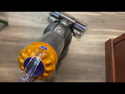 Vacuuming the hallway rug, dining area, and the front door rug with my new dyson ball total clean