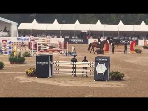 Markus Saurugg und C Jay beim CSI2* in Peking