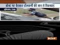 Man drives for 2-3 kms with toll staff on bonnet in Ludhiana