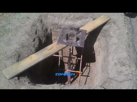 Customers pour concrete foundation before installing wind turbines