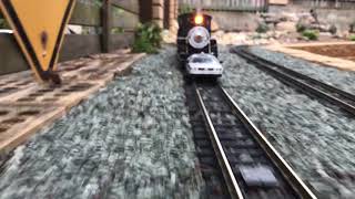 Delorean getting pushed by Steam locomotive