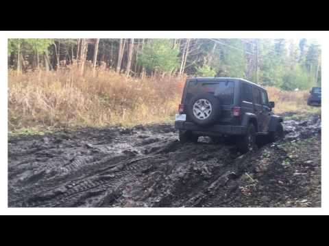 stock wrangler vs modded Wrangler in the mud.