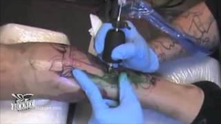 Jason Adkins tattooing with Bicknee T-Iron machines
