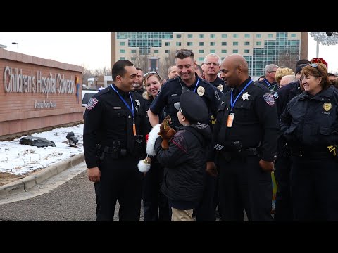 Colorado Police Officers Deliver Holiday Cheer During Long Blue Line Event