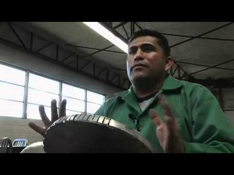 At the Emeco factory - hand welding a Kong chair