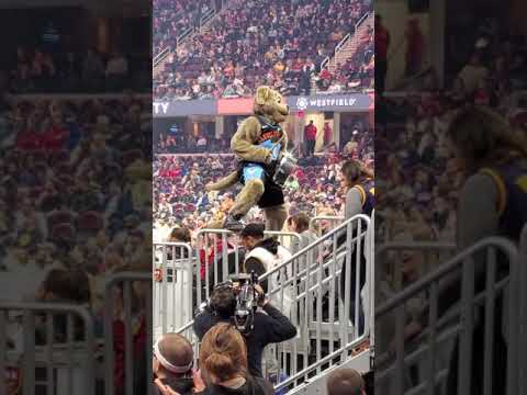 Cleveland Cavs Mascot Moondog banging the drum at the last game before the season was postponed
