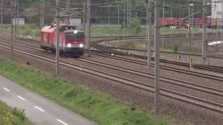 preview picture of video 'Electric locomotive ÖBB 1144.216 + Diesel locomotive Herkules ÖBB 2016 at Kalsdorf bei Graz'