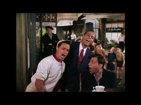 By Strauss - Gene Kelly, Georges Guétary, and Oscar Levant (dubbed by Mack McLean)