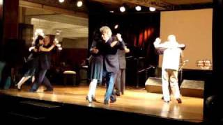 Milongueros dancing to Poema