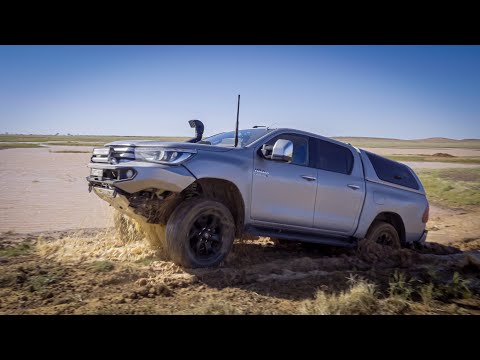 Bogged in the remote Simpson Desert! Starting out the Madigan Line on our double crossing!