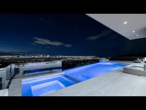 Listing for $6 Million, Dramatic One-Story Modern Home with full sweeping strip view in Henderson NV