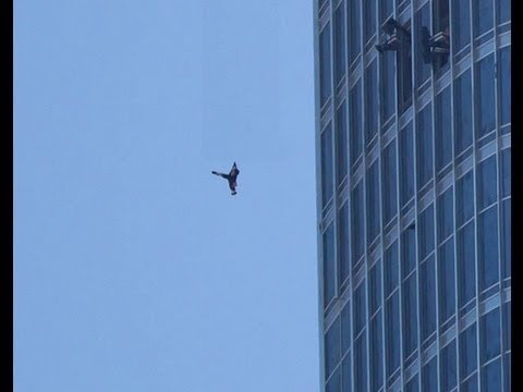 Guy accidentally falls off a skyscraper! OMG!