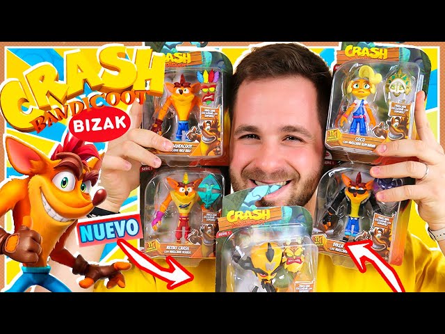 Vídeo relacionado con BANDAI Crash Bandicoot - Figuras de acción Retro con máscara | Juguete Retro de 11 cm con máscara y Accesorios de Soporte | Verde, Morado, Rojo