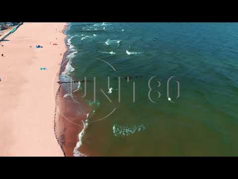 0883 The drone flies over the beach at sunny day.