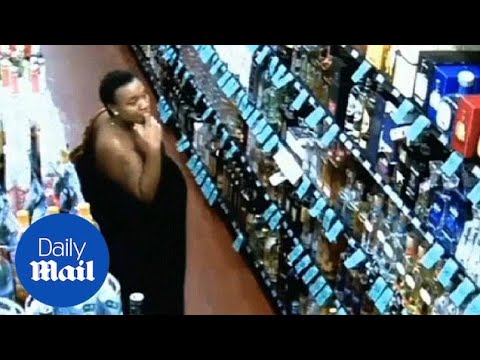 Couple hide bottles in pants and up dress in Miami liquor store - Daily Mail