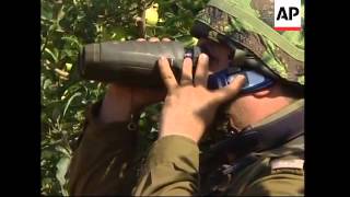WRAP Israeli soldiers moving towards border; Israeli tank hit
