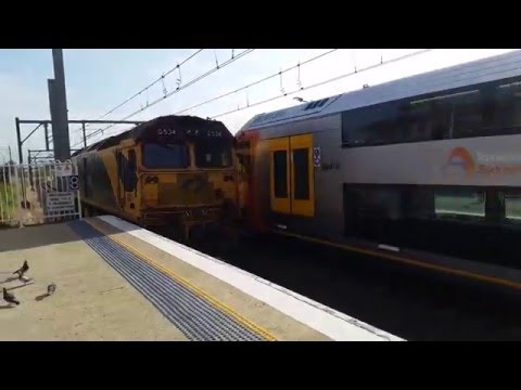 Aurizon loco G534 passing Cabramatta Station, NSW