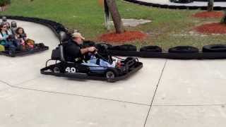 Cooper and Papa G ride the go carts at Adventure Landing Jacksonville Beach