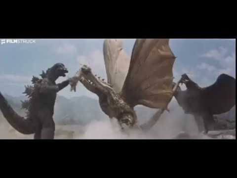 Godzilla boxing like Mike Tyson.
