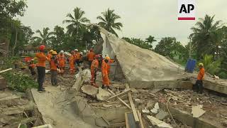 Rescuers search rubble left by West Java quake