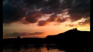 preview picture of video 'Flight of Egrets over the sunset - Shot from Kampot river.'