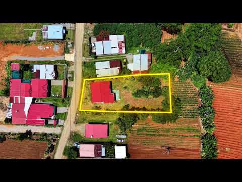 House for Sale in Palmares, Perez Zeledon: Property with Large Flat Lot and Fruit Trees