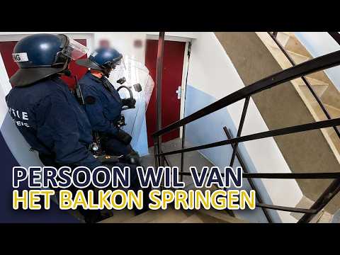 Politie | Persoon wil van het balkon springen | Amsterdam