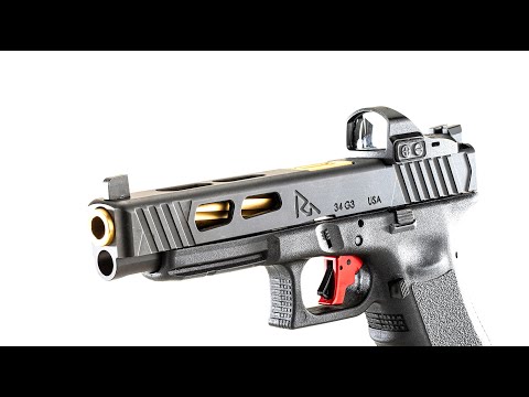 I Carry: Nomad9 Serialized Frame with Rival Arms Slide and Trijicon SRO in a JM Custom Kydex Holster