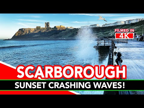 SCARBOROUGH | Waves crashing up against sea wall at sunset in Scarborough!