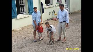 preview picture of video '2006 France   Bretagne, Les Kinois à Saint-Thé, Les Enfants Dans Le Jardin, La Pétanque, en été'