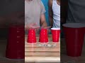 men plays together with red plastic cup #Shorts