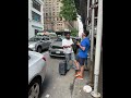 Geno Bisconte argues with a homeless man