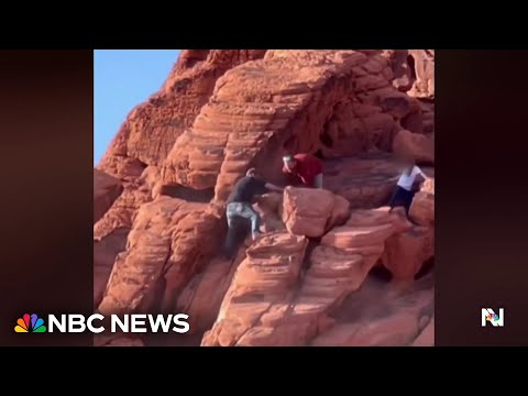 Video shows men damaging ancient rocks in national park