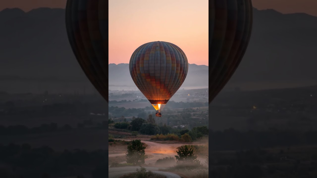 Sunrise Balloon Ride Over Magical Landscapes