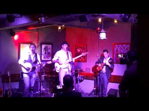 The Old Yellers sing their song "7 Come 11" at Al's Den